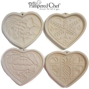 Pampered chef lot of 4 clay heart cookie molds from 1995, 1998, 2000, 2001.